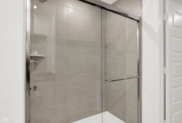 bathroom with an enclosed shower