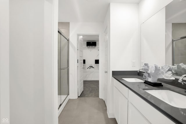 bathroom featuring vanity and walk in shower