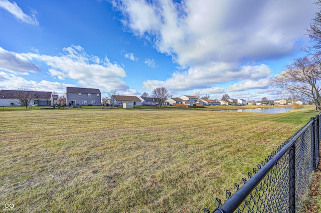 view of yard with a water view