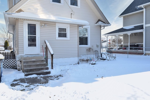 view of snow covered property