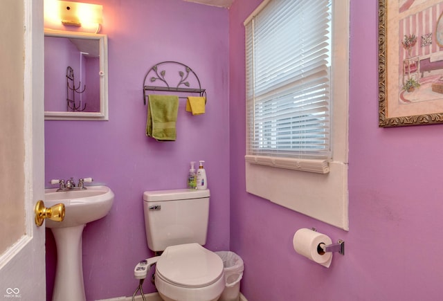 bathroom featuring sink and toilet