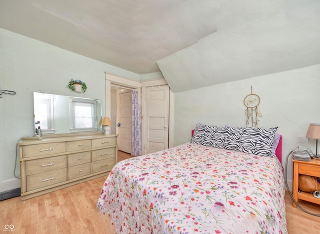 bedroom featuring light wood-type flooring