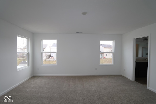 view of carpeted spare room