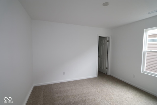 view of carpeted spare room