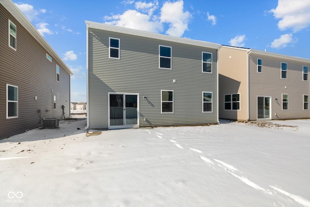 back of house featuring central AC