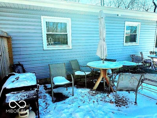 view of snow covered patio