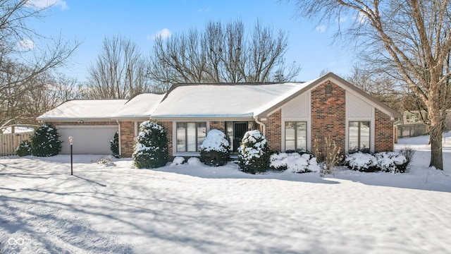 ranch-style home with a garage