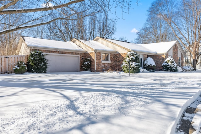 ranch-style house featuring a garage