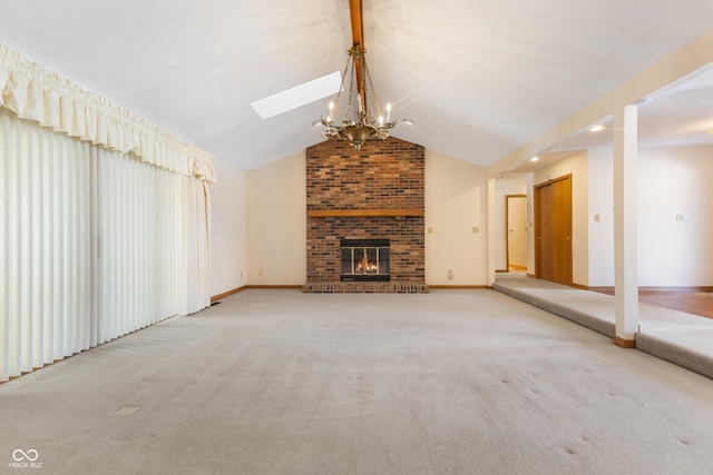 unfurnished living room with an inviting chandelier, a fireplace, light carpet, and vaulted ceiling