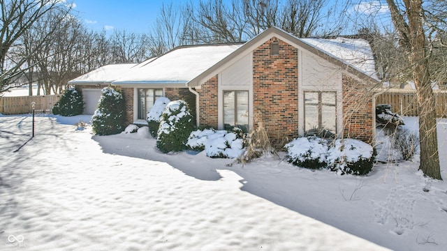 view of snow covered property