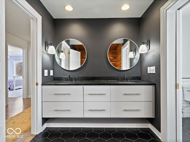 bathroom featuring tile patterned floors and vanity