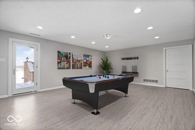 playroom with hardwood / wood-style flooring and pool table