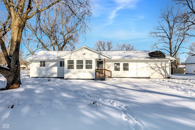 view of snow covered property