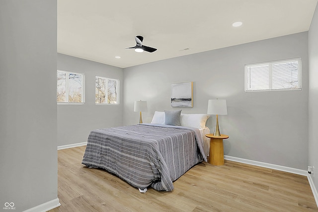 bedroom featuring ceiling fan and light wood-type flooring