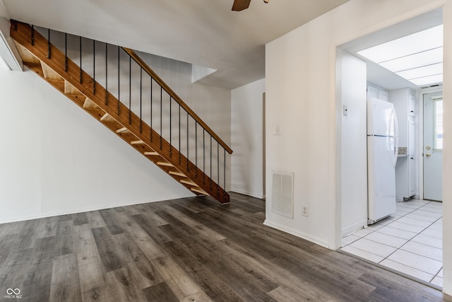 entryway featuring light hardwood / wood-style flooring and ceiling fan