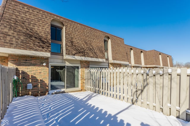 view of snow covered patio