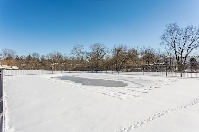 view of yard layered in snow