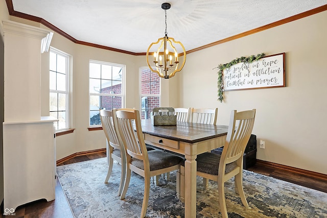 dining room featuring a textured ceiling, a notable chandelier, dark hardwood / wood-style flooring, and crown molding