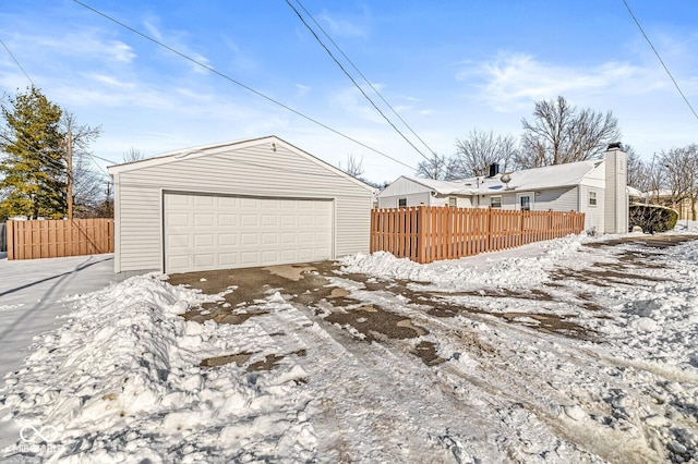 view of snow covered garage