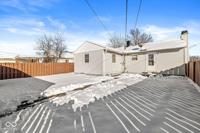 view of snow covered property