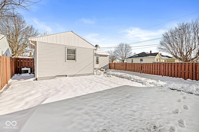 view of snow covered property