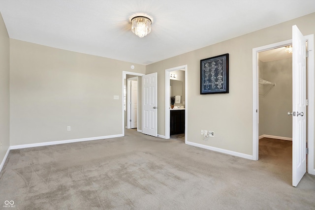 spare room with light colored carpet