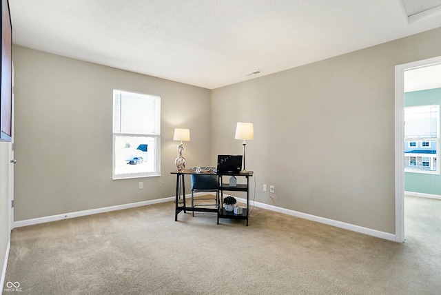 home office featuring light carpet