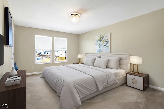 bedroom with light colored carpet