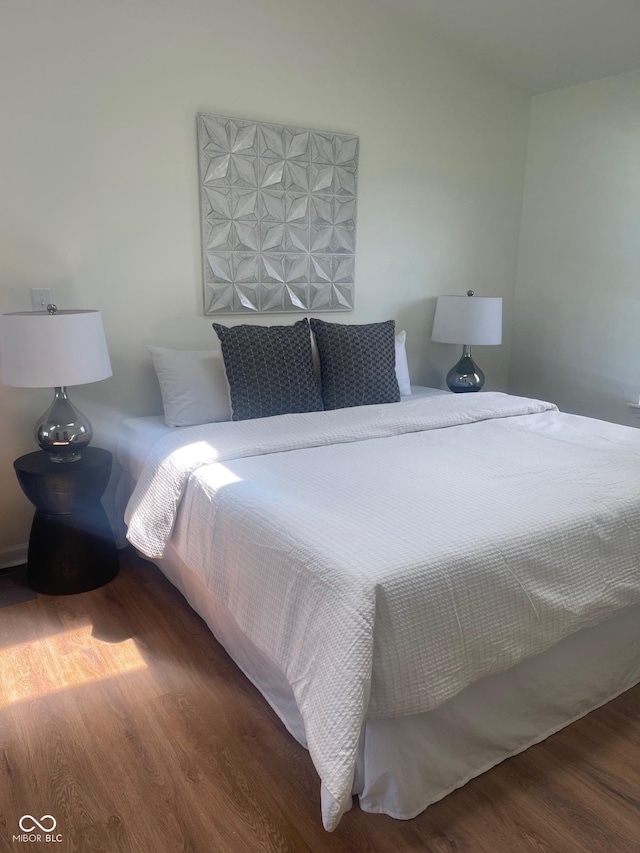 bedroom featuring hardwood / wood-style floors