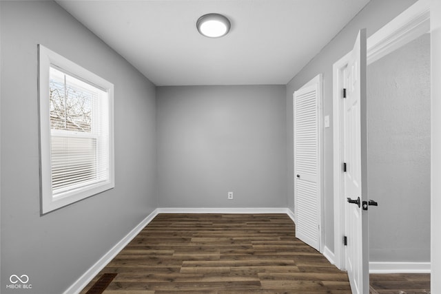 interior space with dark hardwood / wood-style floors