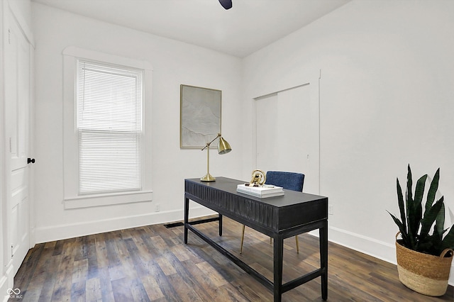 office space with dark wood-type flooring and ceiling fan