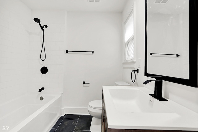 full bathroom with vanity, tiled shower / bath, and toilet