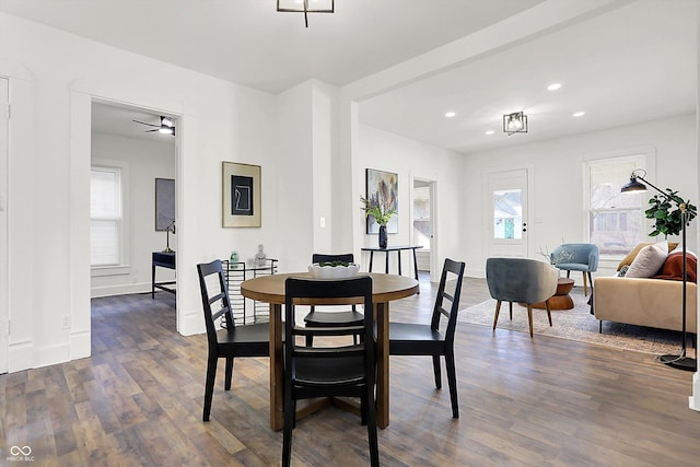 dining room with dark wood-type flooring