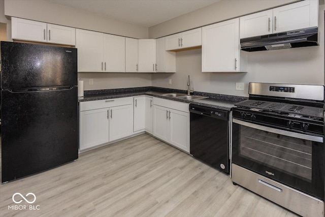 kitchen featuring black appliances, white cabinetry, and sink