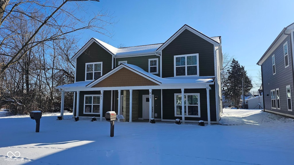 view of property featuring a porch