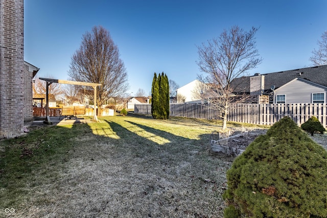 view of yard featuring fence