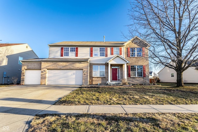 view of front of home with brick siding and driveway