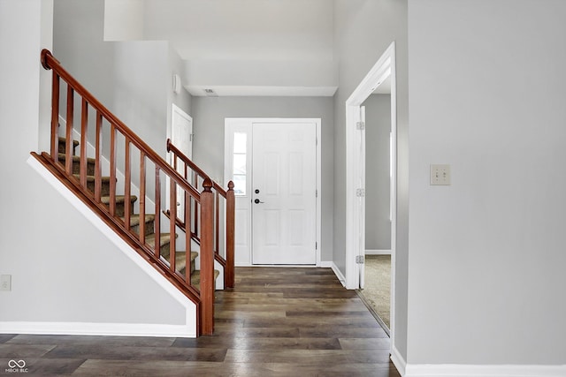 entrance foyer featuring dark hardwood / wood-style flooring