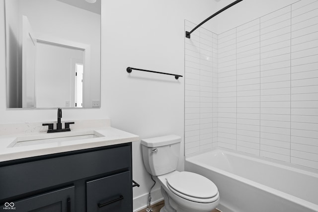 full bathroom featuring vanity, toilet, and tiled shower / bath combo