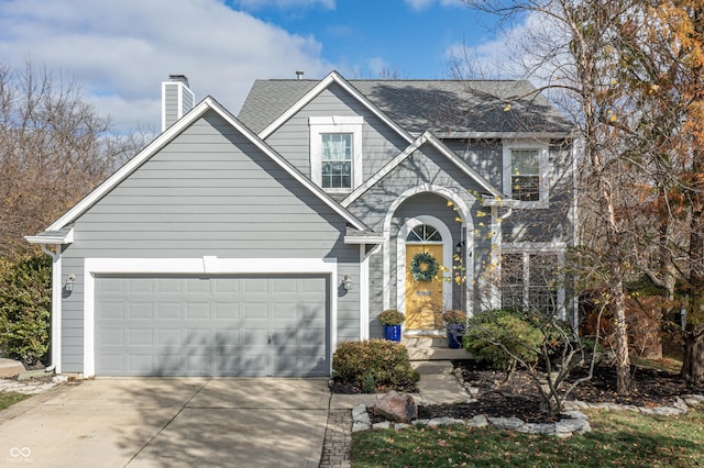 view of front of property with a garage