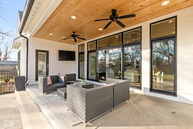 view of patio / terrace featuring an outdoor living space and ceiling fan