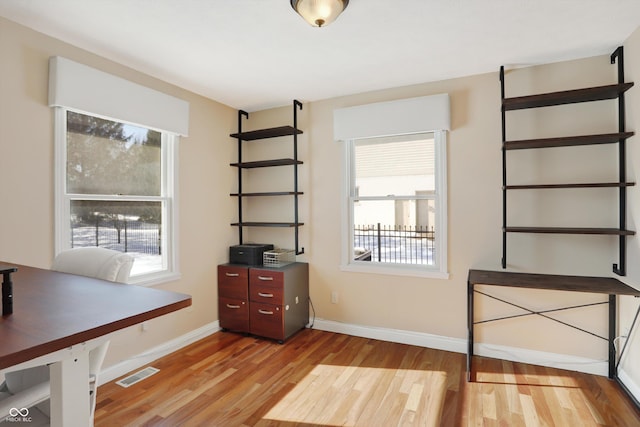 office area with light wood-type flooring