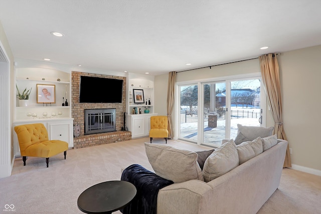 carpeted living room with a fireplace