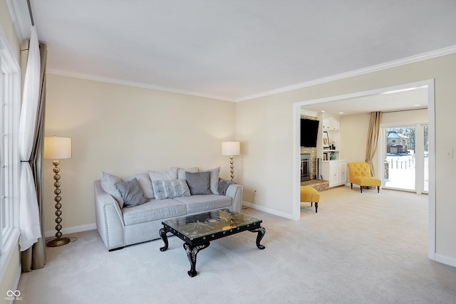 living room with ornamental molding, light carpet, and a fireplace