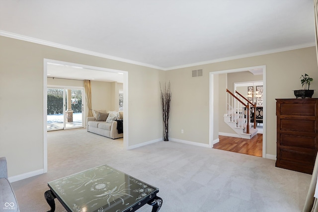 living room with light carpet and ornamental molding