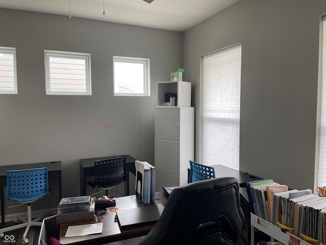 office with ceiling fan and a healthy amount of sunlight