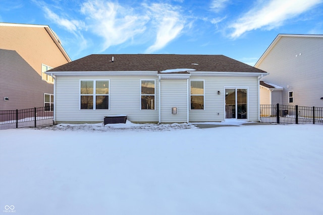 view of snow covered house