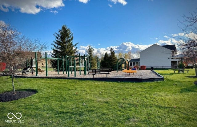 view of playground with a yard