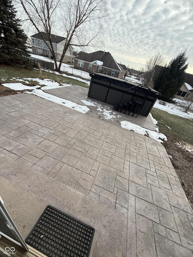 view of snow covered patio