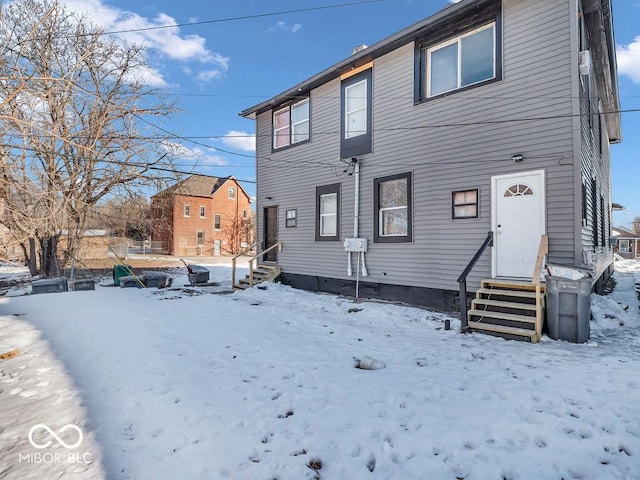 view of snow covered property